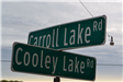 Carroll Lake Road and Cooley Lake Road Signs