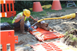 Consumers Energy worker working on gas main along Greenfield Rd. just north of Sheridan Dr.
