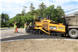 Paving crew at the Sutters Ln. entrance to the Kirkwood SAD district in Bloomfield Township