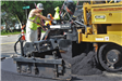 Paving with hot mix asphalt on Sutters Ln. in the Kirkwood SAD district in Bloomfield Township