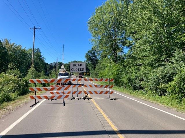 Fish Lake Road Closure shown with barricades, just south of Grange Hall Road 