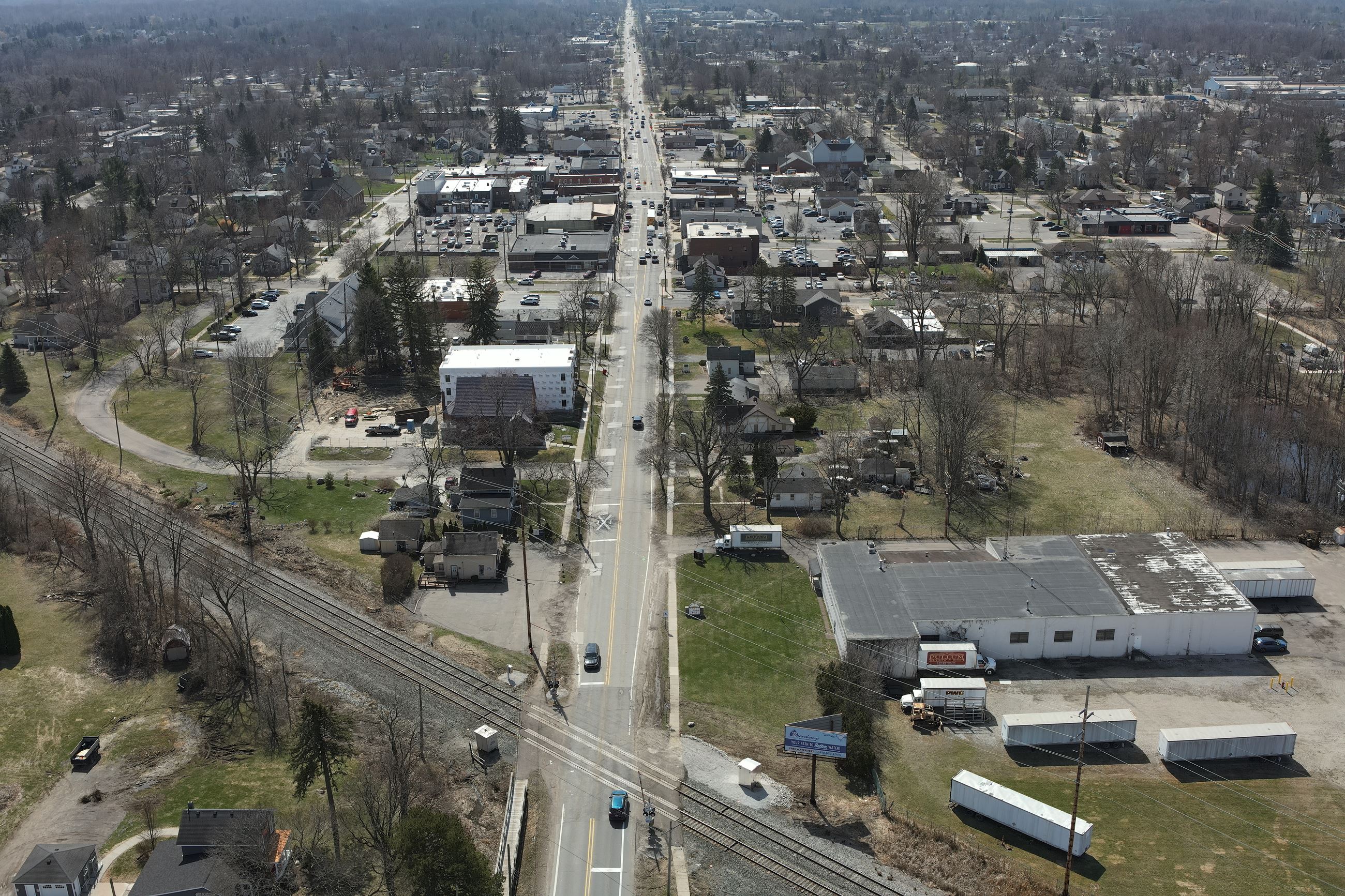 Pontiac Trail/Lafayette Street before construction. Aerial mage is looking south from the railroad t