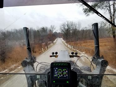 Grader on gravel road (credit to RCOC employee Eric J.)