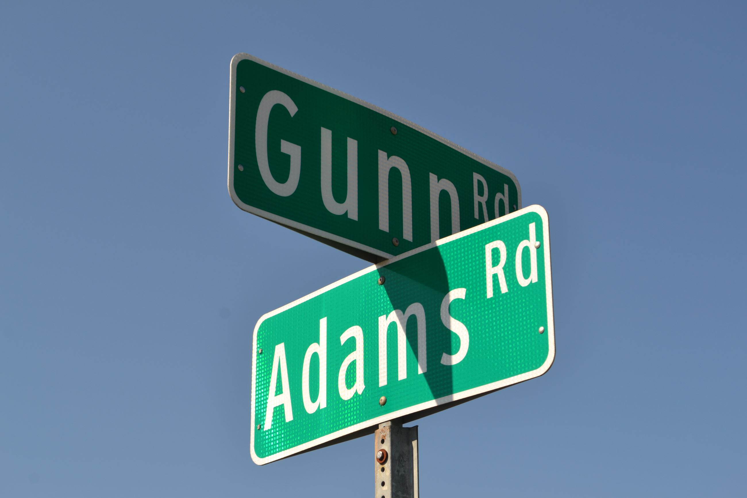 Adams and Gunn Road Sign