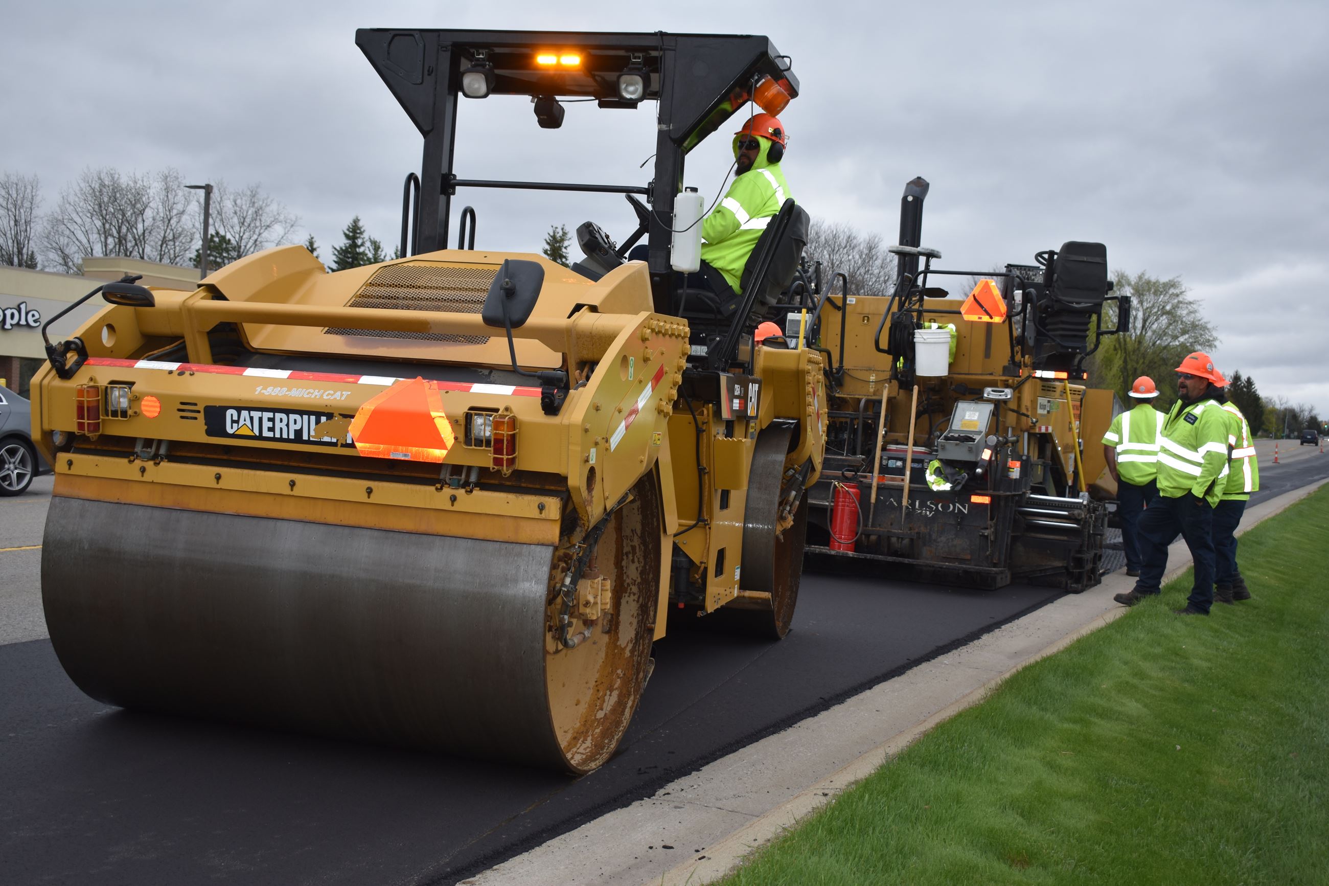 Resurfacing (preservation overlay) on Adams Road north of Walton, crew is paving (5/10/19)
