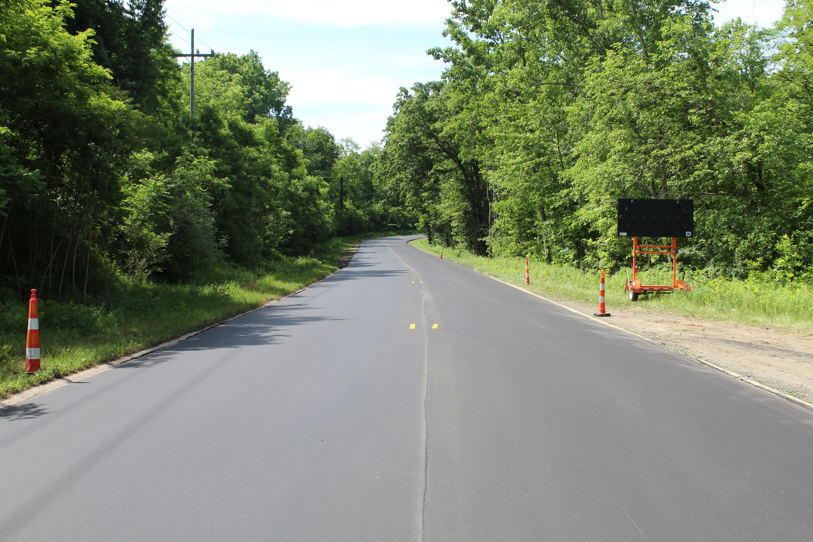 Benstein Rd. after Preservation Overlay paving just south of Sleeth Rd. in Commerce Charter Township